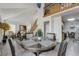 Open layout shows dining adjacent to the living room at 4648 S Abilene Cir, Aurora, CO 80015