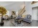 Comfortable living room showcases a neutral color palette and a cozy seating area at 4648 S Abilene Cir, Aurora, CO 80015