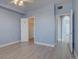 Spacious bedroom with light hardwood floors, and a large closet at 12914 Ironstone Way # 201, Parker, CO 80134