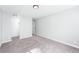 Spacious bedroom with grey carpet and ample closet space at 14396 E Florida Ave # B, Aurora, CO 80012