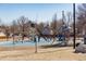 playground with swings and slides at 14396 E Florida Ave # B, Aurora, CO 80012