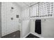 Modern bathroom with a glass shower and hexagon tile floor at 2054 S Xenia Way # 59, Denver, CO 80231