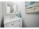 Modern white bathroom vanity with quartz countertop at 2054 S Xenia Way # 59, Denver, CO 80231