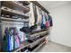 Spacious walk-in closet with ample shelving and hanging space at 2054 S Xenia Way # 59, Denver, CO 80231