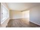 Spacious living room with large windows and light grey walls at 234 Lansing St, Aurora, CO 80010