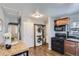 The laundry area features stacked washer and dryer units adjacent to kitchen appliances at 1388 Kenton, Aurora, CO 80010