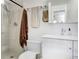 Bathroom featuring a glass door shower, white vanity, towels and modern fixtures at 2636 Juniper Ave # 39-1, Boulder, CO 80304