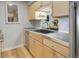 Modern kitchen with stainless steel appliances, light wood cabinetry and a sleek countertop at 2636 Juniper Ave # 39-1, Boulder, CO 80304