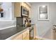 Stylish kitchen with stainless steel appliances, light wood cabinets, and plenty of counter space at 2636 Juniper Ave # 39-1, Boulder, CO 80304