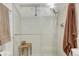 Modern shower with glass door, bench, handheld showerhead and neutral walls at 2636 Juniper Ave # 39-1, Boulder, CO 80304