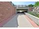 View of a clean underpass with brick and concrete walls, providing safe passage for pedestrians along Iris Avenue at 2636 Juniper Ave # 39-1, Boulder, CO 80304