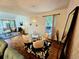 Open-concept living room featuring modern decor, high ceilings, and plenty of natural light at 1073 W Powers Ave, Littleton, CO 80120