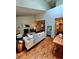 Bright, open living room with high ceilings, modern furniture, and stylish decor at 1073 W Powers Ave, Littleton, CO 80120