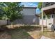 This backyard features a partially grass and stone yard at 20031 Elgin Dr, Denver, CO 80249