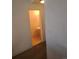 Small half-bathroom featuring a simple pedestal sink and a mirrored medicine cabinet at 2793 Roslyn St, Denver, CO 80238