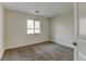 Well-lit bedroom with neutral walls, carpet, and bright window, creating a comfortable and inviting space at 7450 Lowell Blvd # B, Westminster, CO 80030