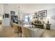 Spacious living area with an open layout, stylish furnishings and natural light at 74 Blue Heron Dr, Greenwood Village, CO 80121