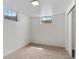 Finished basement with window and sliding door closet at 1637 S Stuart St, Denver, CO 80219