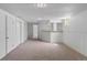 The basement is finished with a bar, carpet and lighting at 1637 S Stuart St, Denver, CO 80219