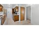 Functional kitchen features updated hardware, ample cabinet space, and durable countertops for everyday cooking at 1637 S Stuart St, Denver, CO 80219