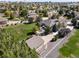 Overhead aerial view of the property, displaying the house, garage, and surrounding landscape at 6449 E 163Rd Ave, Brighton, CO 80602