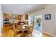 Charming dining area next to the kitchen, featuring a sliding glass door to the patio at 6449 E 163Rd Ave, Brighton, CO 80602