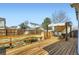 Outdoor deck area perfect for entertaining, featuring a wooden bench and pergola at 2175 E 126Th Way, Thornton, CO 80241
