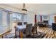 Bright dining area adjacent to living room features sliding glass doors to the backyard at 2175 E 126Th Way, Thornton, CO 80241