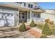 Charming two-story home featuring a two-car garage and inviting front porch at 2175 E 126Th Way, Thornton, CO 80241