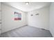 Bright bedroom features neutral carpet and natural light at 13625 E 103Rd Pl, Commerce City, CO 80022