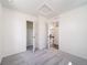 Bedroom featuring a closet and neutral carpet at 13625 E 103Rd Pl, Commerce City, CO 80022