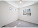 Bright bedroom with neutral carpet and natural light from the window at 13625 E 103Rd Pl, Commerce City, CO 80022