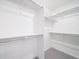 Walk-in closet with shelving and ample storage space at 13625 E 103Rd Pl, Commerce City, CO 80022