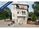 Charming new two-story home boasts a balcony, neutral siding, and stylish architectural details at 13625 E 103Rd Pl, Commerce City, CO 80022