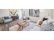 Welcoming living room featuring stylish furnishings, a large window, and tasteful decor at 13625 E 103Rd Pl, Commerce City, CO 80022