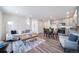 Open-concept living space seamlessly blends the kitchen, dining, and living areas at 13625 E 103Rd Pl, Commerce City, CO 80022