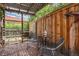 Enclosed brick patio with seating, pergola, and garden decor at 1900 Magnolia St, Denver, CO 80220