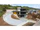 Luxury home with modern design, expansive driveway and hillside location at 8077 Raphael Ln, Littleton, CO 80125