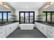 Luxurious bathroom with soaking tub, double sinks, and stylish fixtures at 8077 Raphael Ln, Littleton, CO 80125
