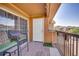 Cozy outdoor balcony with seating, offering a relaxing space with views at 17497 Nature Walk Trl # 302, Parker, CO 80134