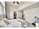 Cozy bedroom features a vaulted ceiling, closet and a calming color palette at 17497 Nature Walk Trl # 302, Parker, CO 80134