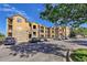 Inviting condo complex featuring stone accents, balconies, and ample parking in a well-maintained community at 17497 Nature Walk Trl # 302, Parker, CO 80134