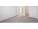 Spacious bedroom with neutral carpet and two closets ready for personalization at 9081 Telluride Ct, Commerce City, CO 80022