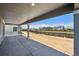 Covered patio space overlooks the backyard, perfect for outdoor entertaining at 9081 Telluride Ct, Commerce City, CO 80022