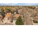 Charming neighborhood aerial view featuring tree-lined streets, well-maintained homes, and stunning mountain views at 1571 S Trenton Ct, Denver, CO 80231