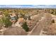 Charming neighborhood aerial view featuring tree-lined streets, well-maintained homes, and stunning mountain views at 1571 S Trenton Ct, Denver, CO 80231