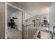 Second story hallway leading to an office space at 1571 S Trenton Ct, Denver, CO 80231