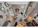 Aerial view of a spacious living room with fireplace and a soaring two story ceiling at 1571 S Trenton Ct, Denver, CO 80231