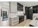 Stylish kitchen featuring modern appliances, sleek countertops, and a minimalist design at 2921 Newton St, Denver, CO 80211