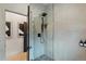 Contemporary shower with sleek fixtures, modern tiling, and glass enclosure, creating a spa-like experience at 2921 Newton St, Denver, CO 80211